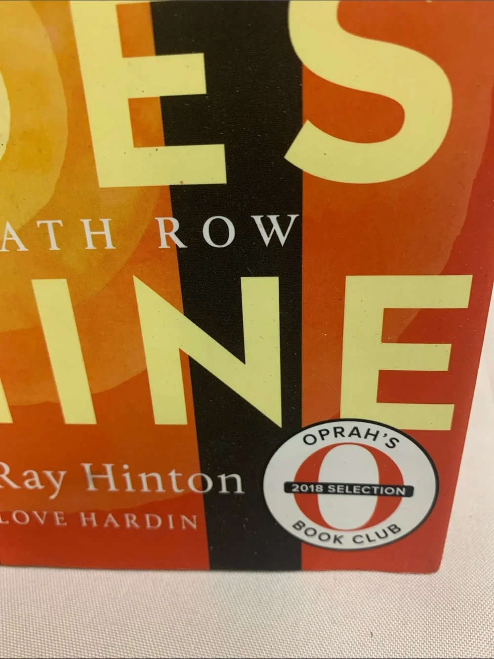 The Sun Does Shine by Anthony Ray Hinton — Orange Hardcover Book